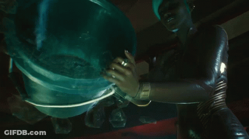 Woman Holding Bucket Of Ice Cubes GIF