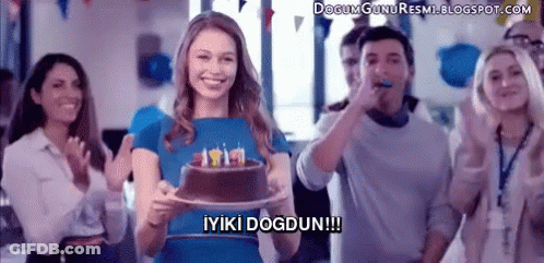 Woman Holding Cake With Candles GIF