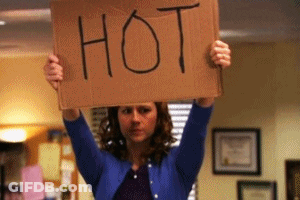 Woman Holding Cardboard Sign Saying Hot GIF