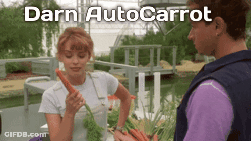 Woman Holding Carrot To Man Darn Autocarrot GIF