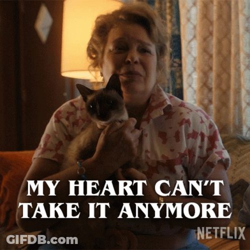 Woman Holding Cat Saying My Heart Can't Take It Anymore GIF