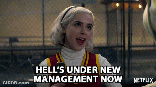 Woman Holding Cell Phone Hell Under New Management GIF