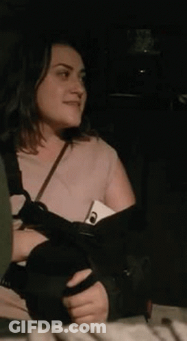 Woman Holding Cell Phone In Back Seat GIF