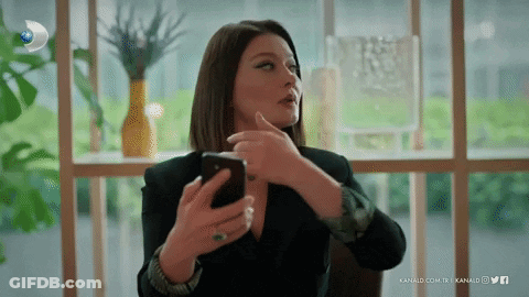 Woman Holding Cell Phone GIF