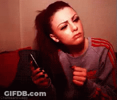 Woman Holding Cell Phone Saying Chorbearswagg GIF