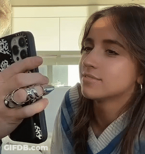 Woman Holding Cell Phone With Casetify Case GIF