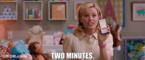 Woman Holding Cell Phone With Stuffed Animals GIF