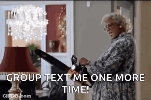 Woman Holding Chainsaw Says Group Text Me One More Time GIF