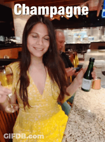 Woman Holding Champagne Bottle And Glass GIF