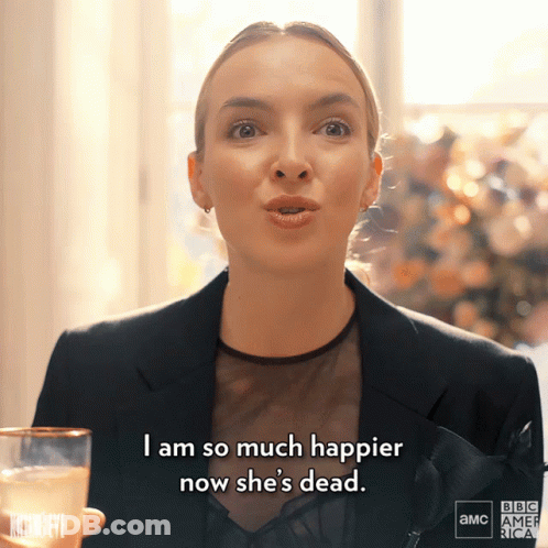 Woman Holding Champagne Saying I Am So Much Happier Now She's Dead GIF
