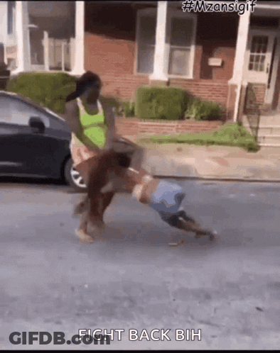 Woman Holding Child On Ground With Car Behind GIF