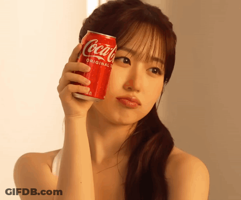 Woman Holding Coca Cola Original Can GIF