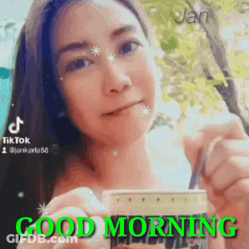 Woman Holding Coffee Says Good Morning GIF