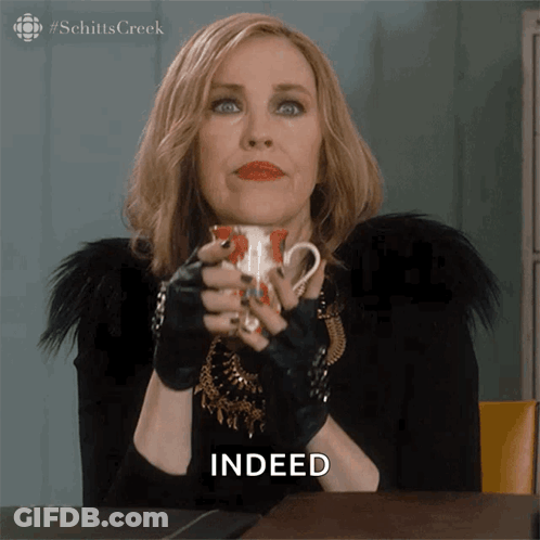 Woman Holding Coffee With Indeed GIF