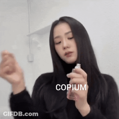 Woman Holding Copium Bottle GIF