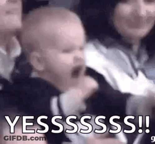 Woman Holding Crying Baby In Crowd GIF