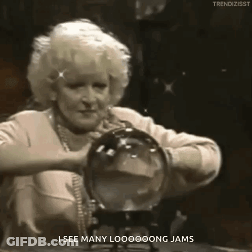 Woman Holding Crystal Ball Says I See Many Looooong Jams GIF