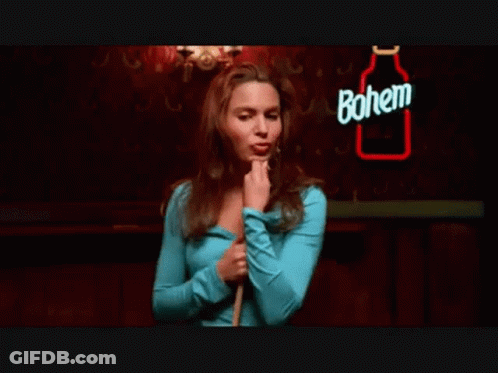 Woman Holding Cue Stick By Pool Table GIF