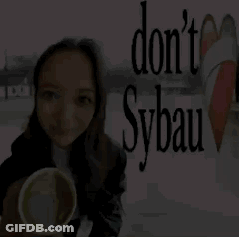 Woman Holding Cup By Sign Do N't Sybau GIF