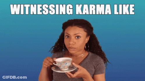 Woman Holding Cup Of Tea Witnessing Karma Like GIF