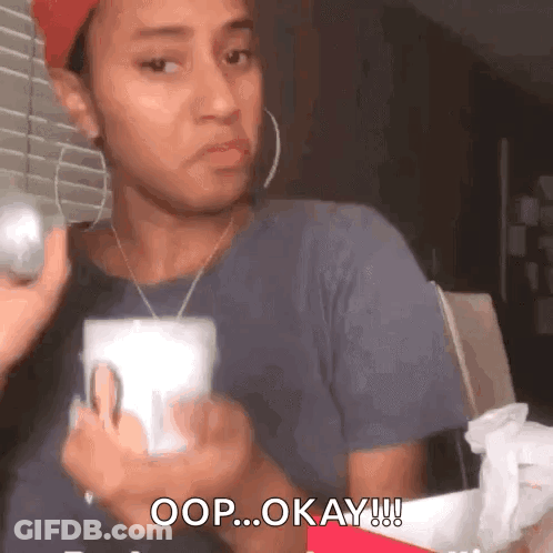 Woman Holding Cup Saying Okay GIF