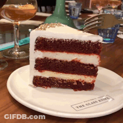 Woman Holding Dessert Plate With Heart GIF