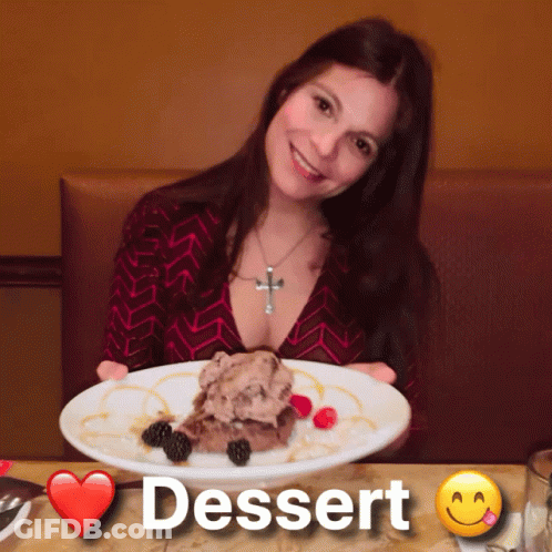 Woman Holding Dessert Plate With Heart GIF