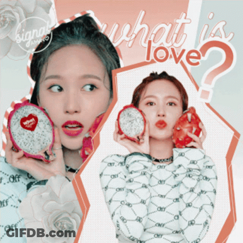 Woman Holding Dragon Fruit Saying What Is Love GIF