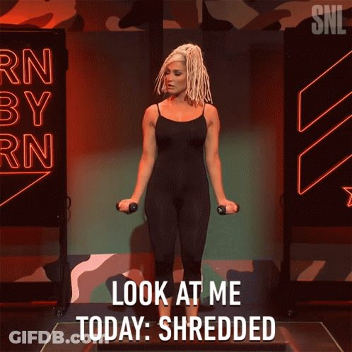 Woman Holding Dumbbells Look At Me Today Shredded GIF