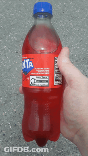 Woman Holding Fanta Can In Front Of Face GIF
