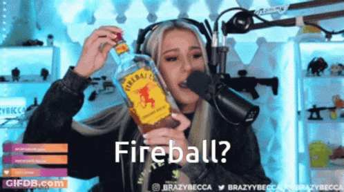 Woman Holding Fireball Bottle And Talking GIF