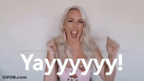 Woman Holding Fist And Saying Yay GIF