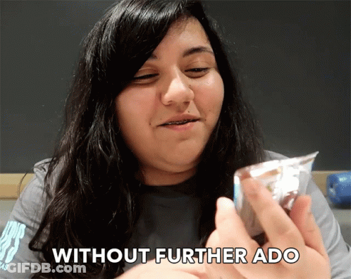 Woman Holding Food Without Further Ado GIF