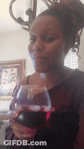Woman Holding Glass Of Red Wine GIF