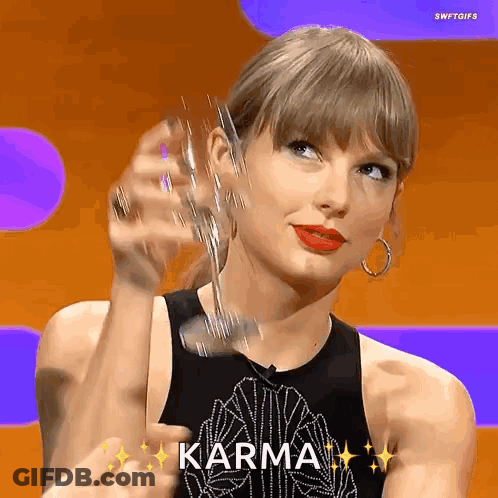 Woman Holding Glass Says Karma GIF