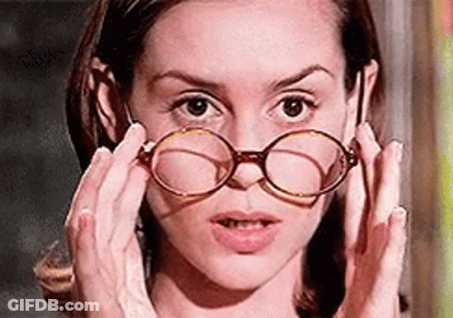Woman Holding Glasses To Face GIF