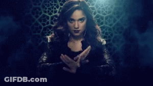 Woman Holding Glowing Object GIF