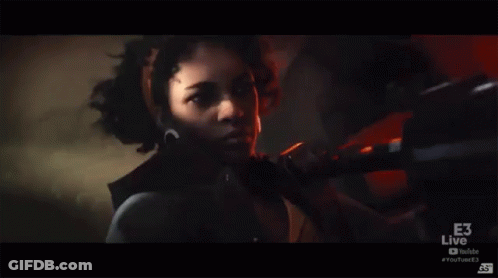 Woman Holding Gun In Front Of E3 Live Advertisement GIF