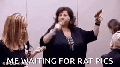 Woman Holding Gun Next To Another Woman GIF