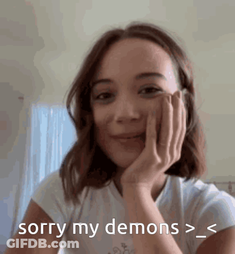 Woman Holding Hand To Face Saying Sorry My Demons GIF