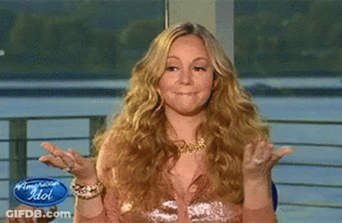 Woman Holding Hands Up American Idol Sign GIF