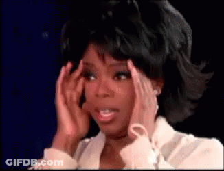 Woman Holding Head In Pain On TV Show GIF