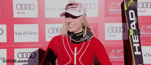 Woman Holding Head Skis GIF