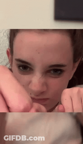 Woman Holding Her Nose Close Up GIF