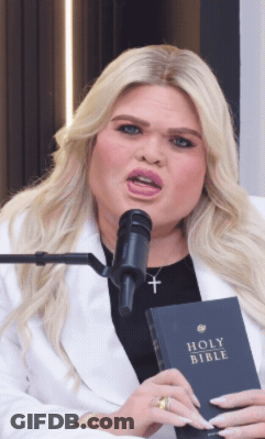 Woman Holding Holy Bible GIF