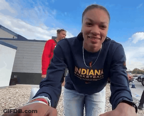 Woman Holding Indiana Jersey GIF