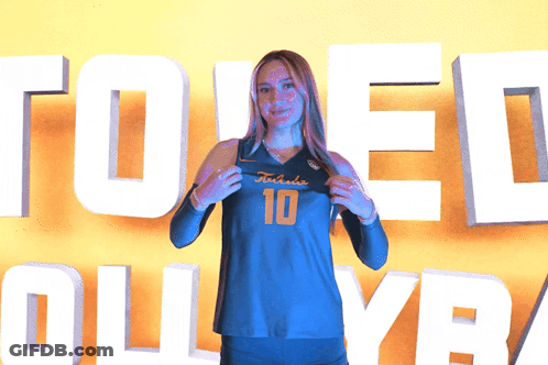 Woman Holding Jersey Number 10 GIF
