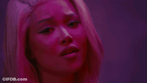 Woman Holding Knife In Dark Room GIF
