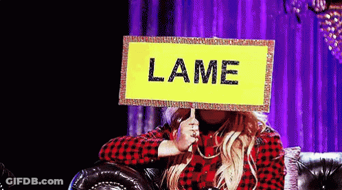 Woman Holding Lame Sign GIF