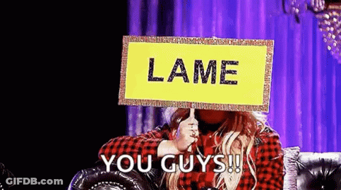 Woman Holding Lame You Guys Sign On Couch GIF
